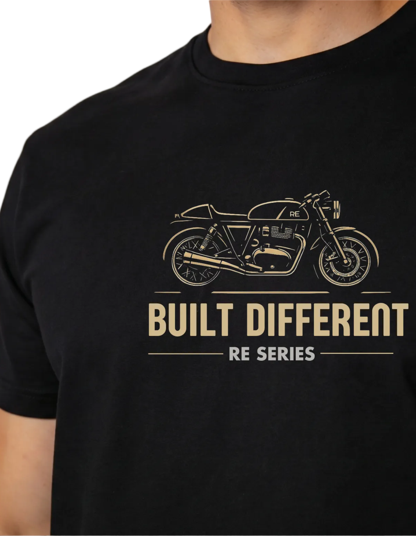 Close-up detail of BUILT DIFFERENT design showing detailed café racer motorcycle 
with engine, pipes, wheels, and technical line work in gold on black cotton
